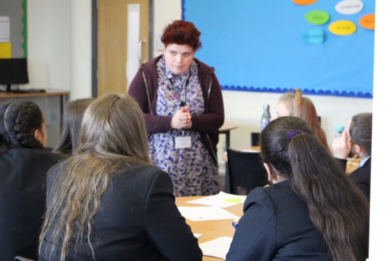 Sarah facilitating a conversation with school pupils