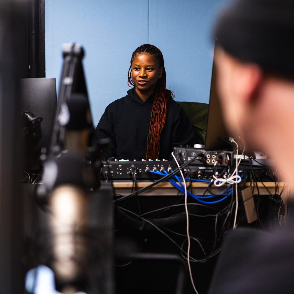 Aisha in production at Reform Radio