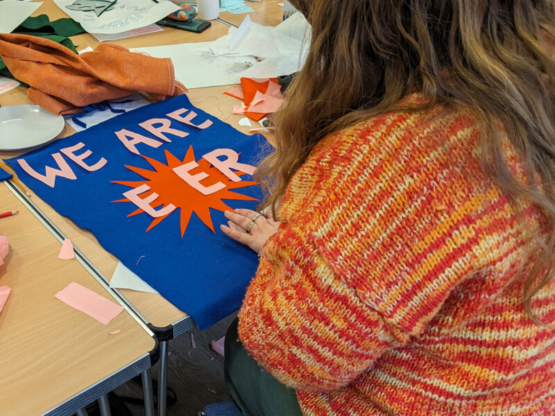 Banner making workshop in action
