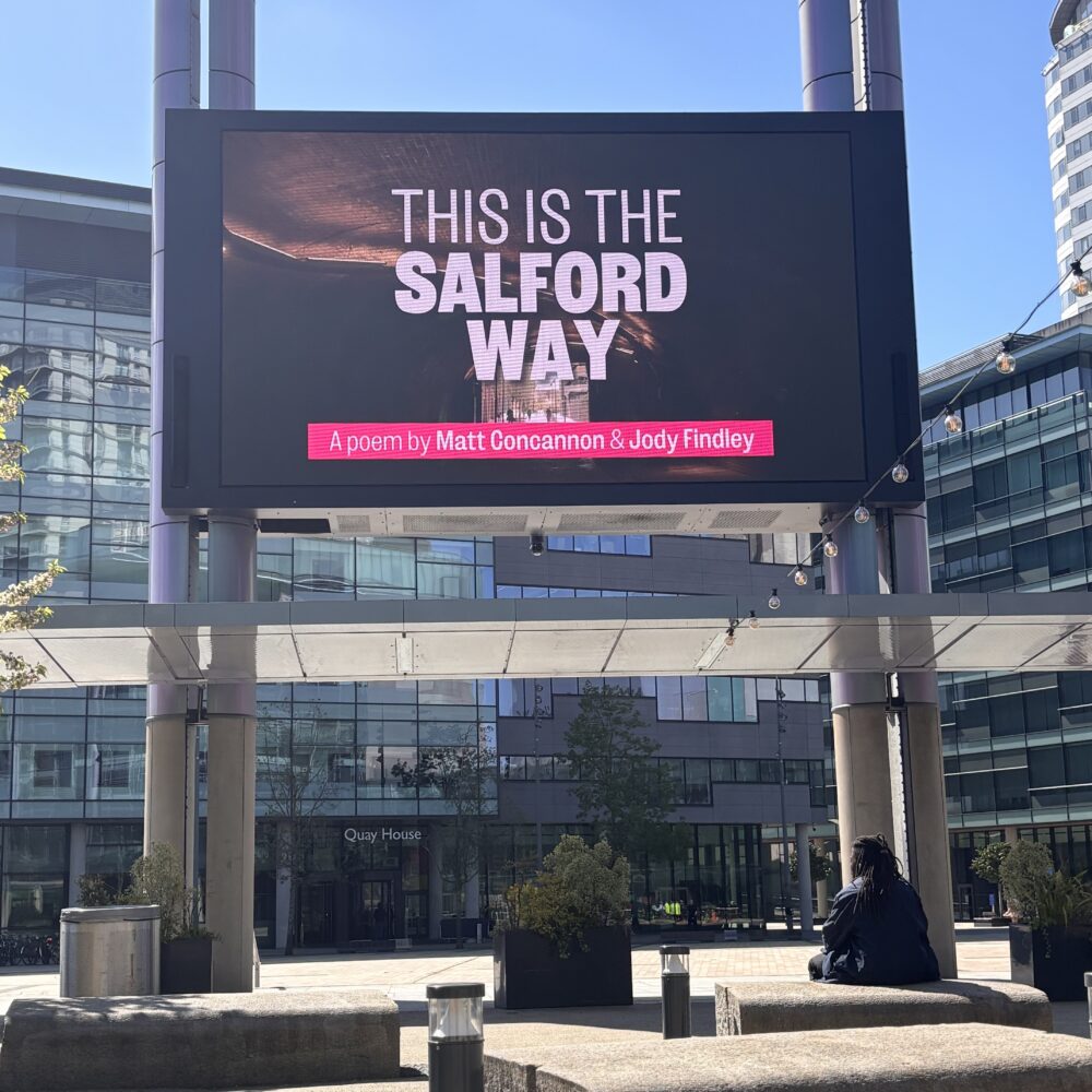 This is the Salford Way film screening on a large screen at Media City in Salford