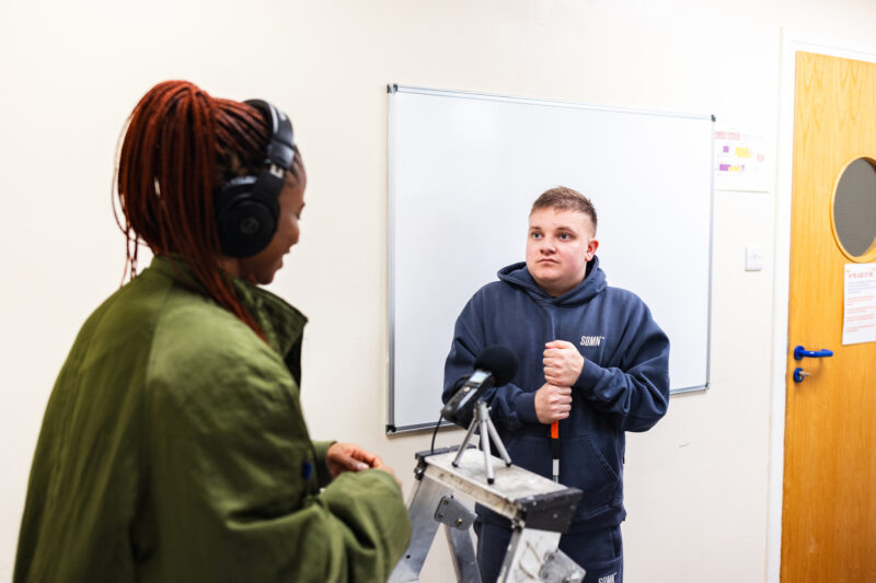 Reform Radio producer Aisha interviews communtiy collaborator Ryan at Langworthy Cornerstone